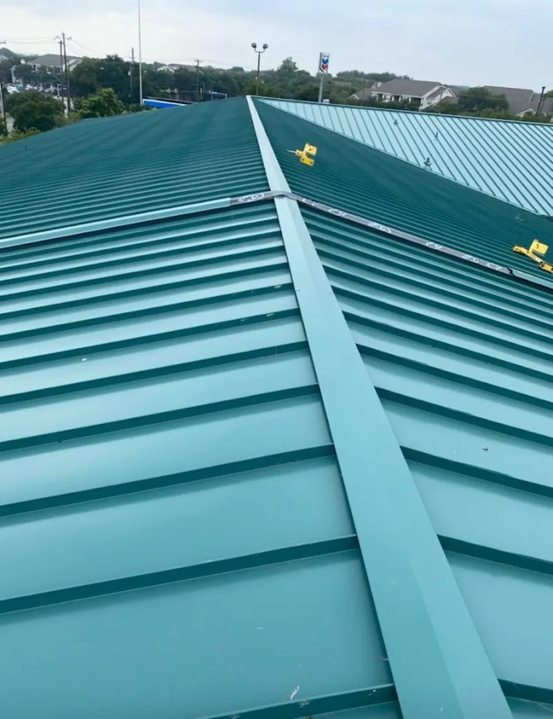 Green commercial metal roof ridge and valley for Metal Roof Repair in Three Oaks